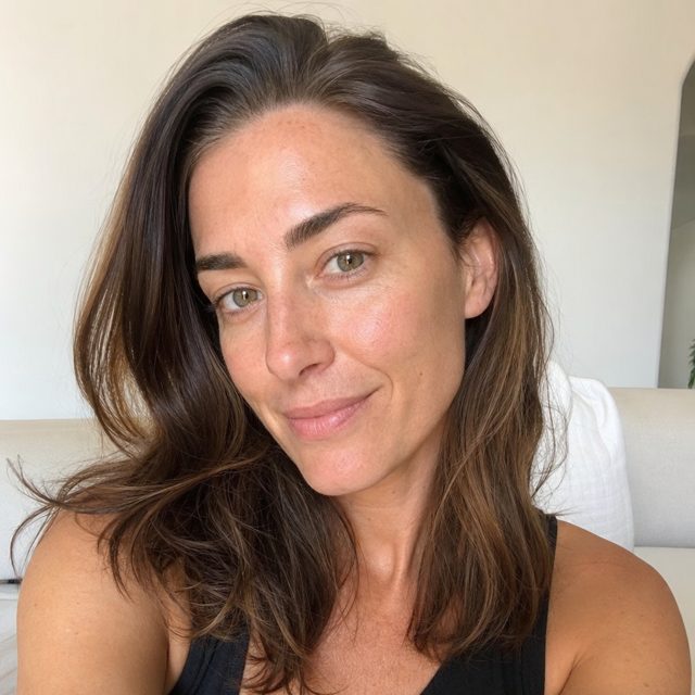 Phone selfie of a woman before AI headshot processing