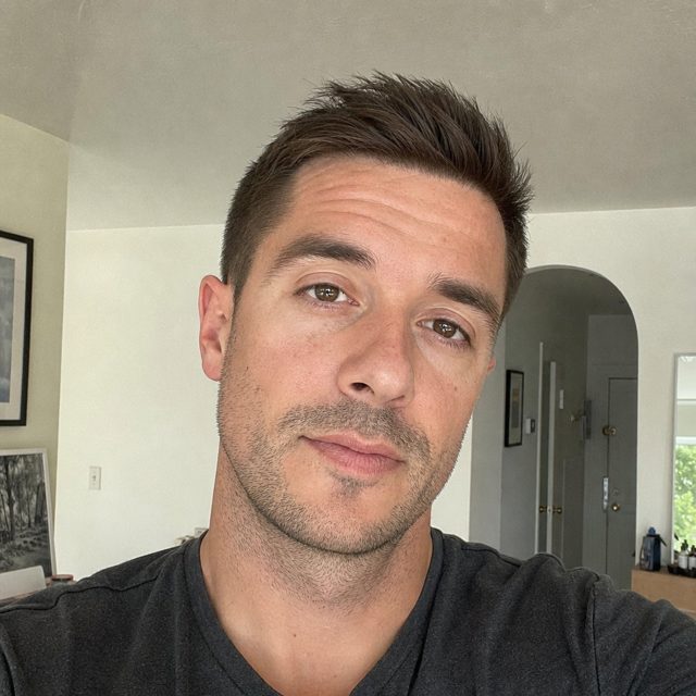 Phone selfie of a man before AI headshot processing